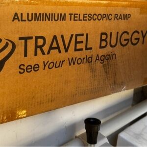 Travel Buggy Aluminum Telescopic Ramp. Never been used, still in box.